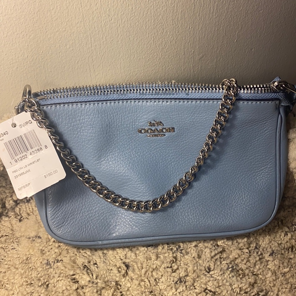 Baby blue COACH wristlet
